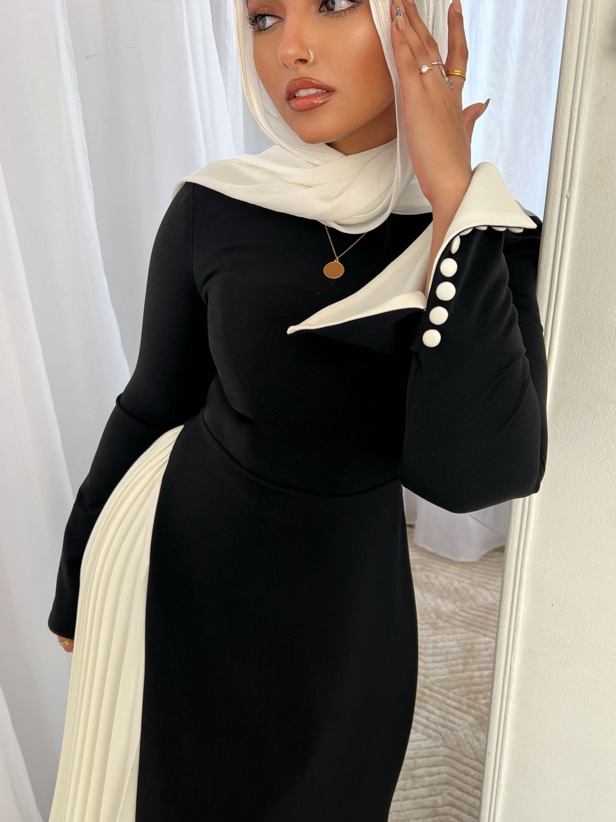 Black Asymmetrical Dress with Buttoned Sleeves