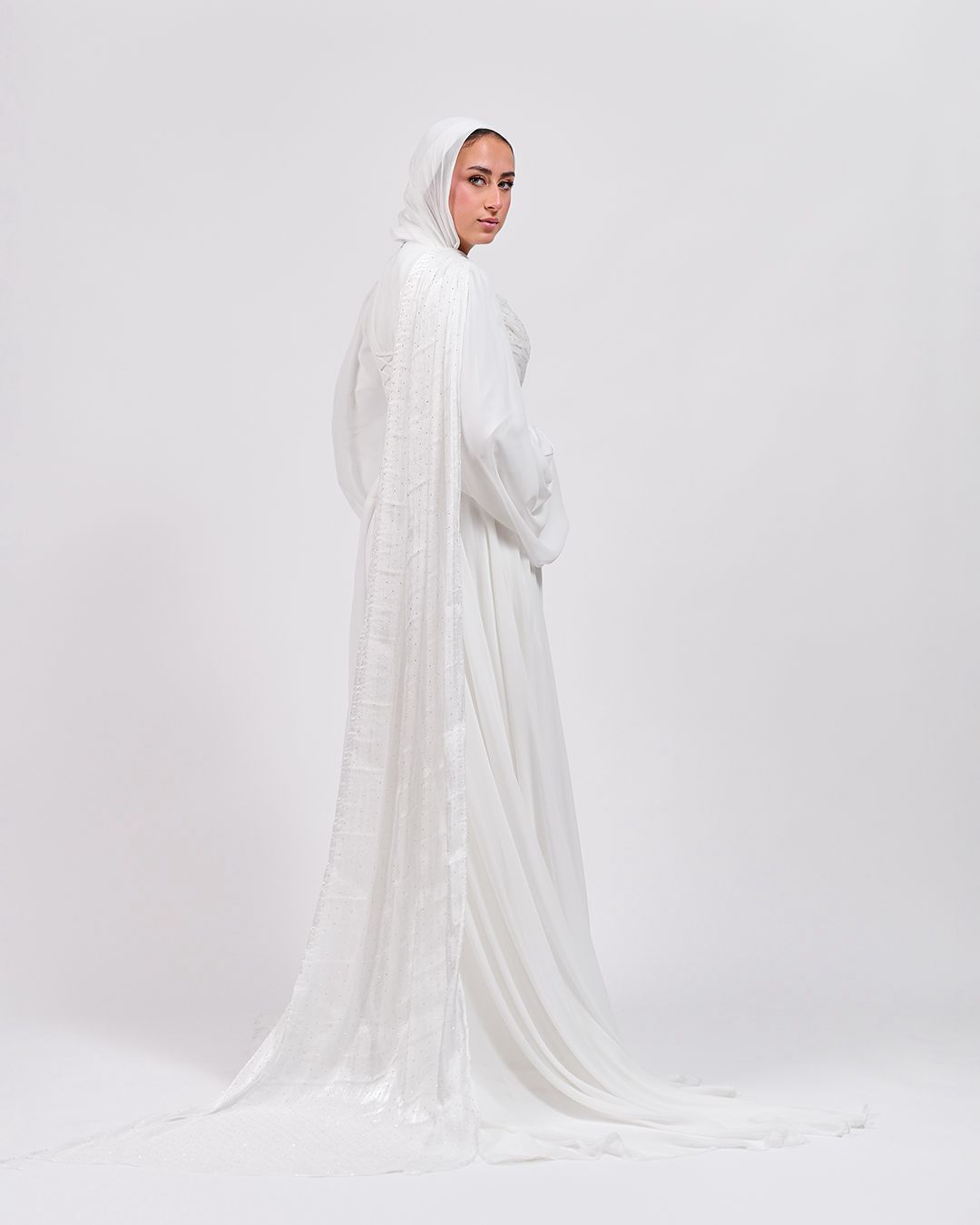 The Serene Drape Dress in Off White – Shoulder Extension & Shimmer