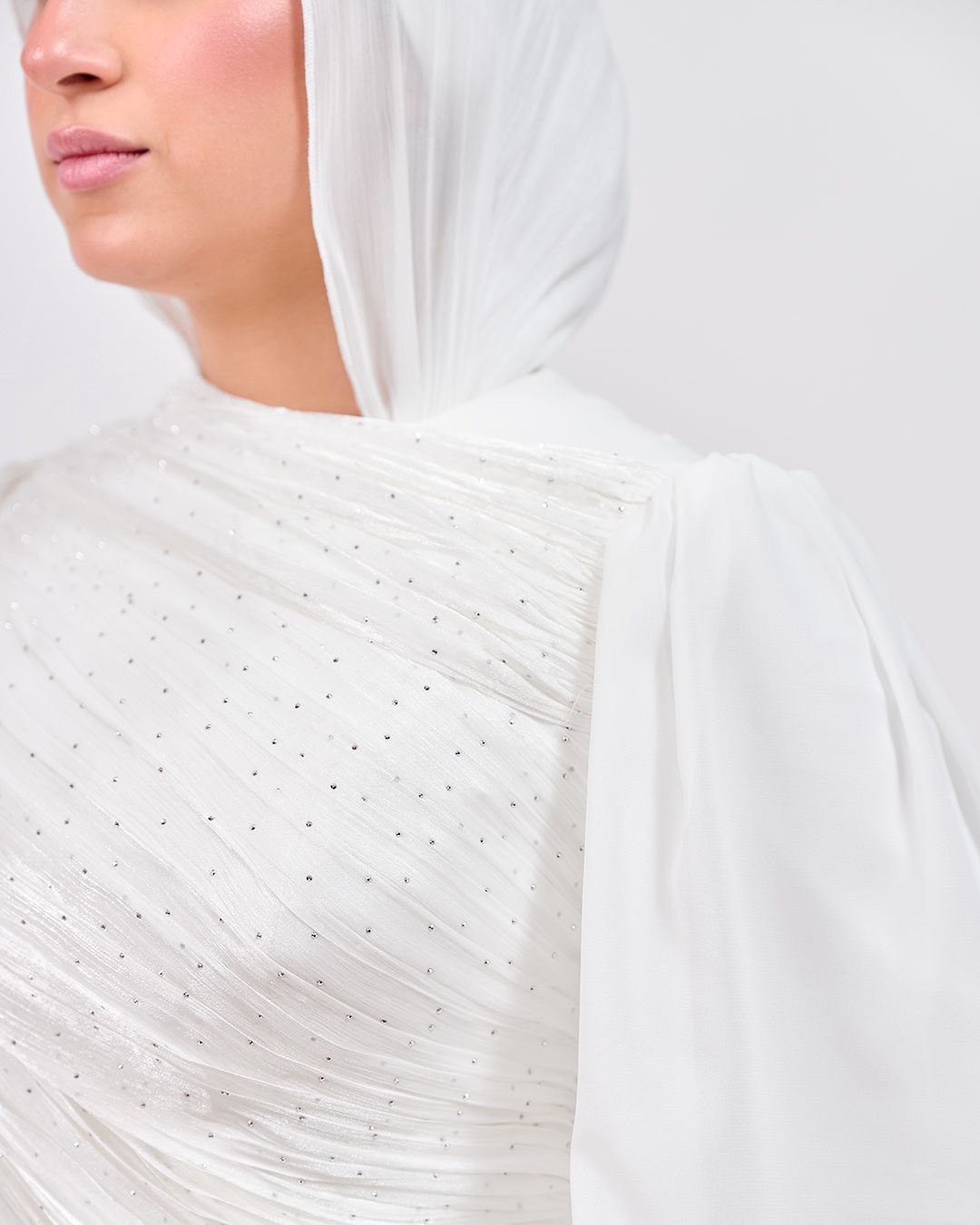 The Serene Drape Dress in Off White – Shoulder Extension & Shimmer